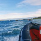 Group of students taking part in the Irish Sailing National Powerboat Certificate course on a powerboat in Dublin